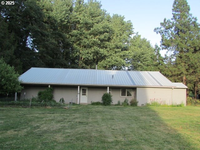 21451 SE Webfoot Rd, Dayton, OR 97114 - view of side of property with a lawn and metal roof