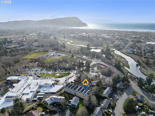 bird's eye view with a water view