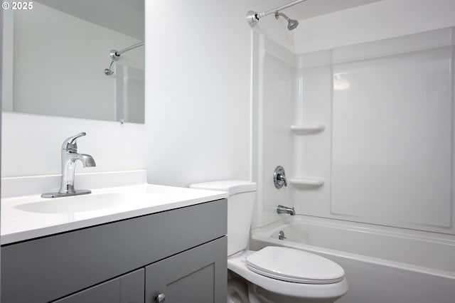 full bathroom featuring shower / tub combination, vanity, and toilet