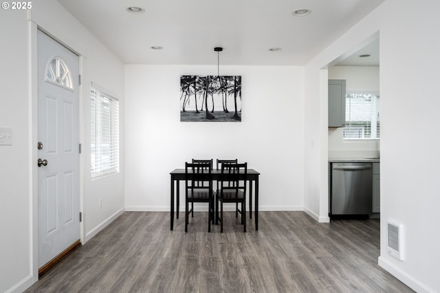 dining room featuring dark hardwood / wood-style flooring