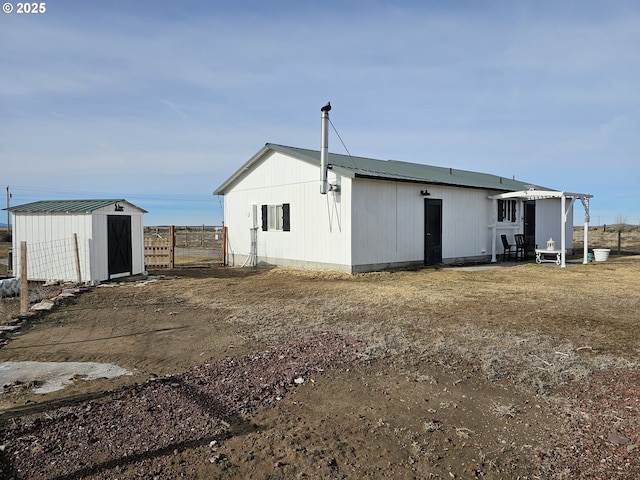 exterior space featuring a storage shed