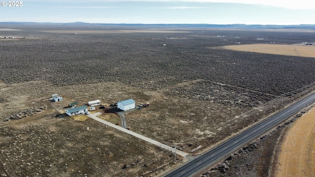 drone / aerial view featuring a rural view