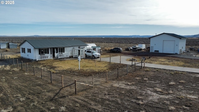 view of yard with a porch and a mountain view