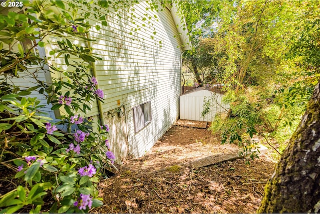 3663 Wilshire Ln, Eugene, OR 97405 - view of side of property with a shed and an outdoor structure