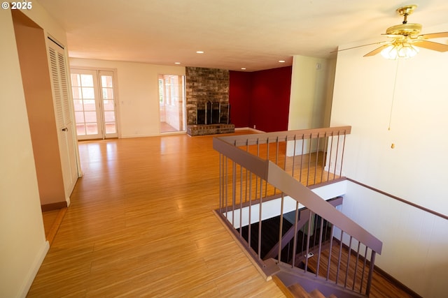 3663 Wilshire Ln, Eugene, OR 97405 - hallway featuring an upstairs landing, light wood finished floors, baseboards, and recessed lighting