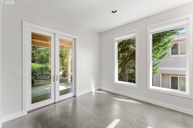 370 NW 81st Pl, Portland, OR 97229 - unfurnished room with french doors and baseboards