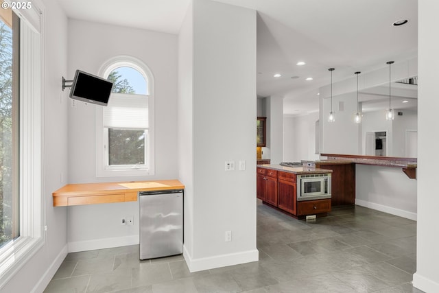 370 NW 81st Pl, Portland, OR 97229 - bar area with fridge, baseboards, stainless steel microwave, and recessed lighting