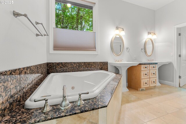 370 NW 81st Pl, Portland, OR 97229 - bathroom with a tub with jets, tile patterned flooring, and a sink