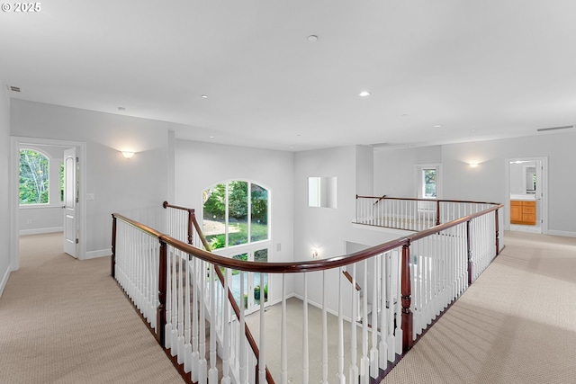370 NW 81st Pl, Portland, OR 97229 - hall featuring light carpet, an upstairs landing, baseboards, plenty of natural light, and recessed lighting