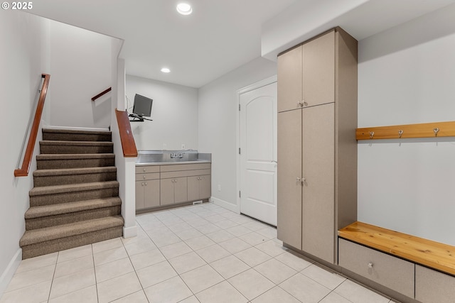 370 NW 81st Pl, Portland, OR 97229 - kitchen with recessed lighting, a sink, baseboards, light tile patterned floors, and light countertops