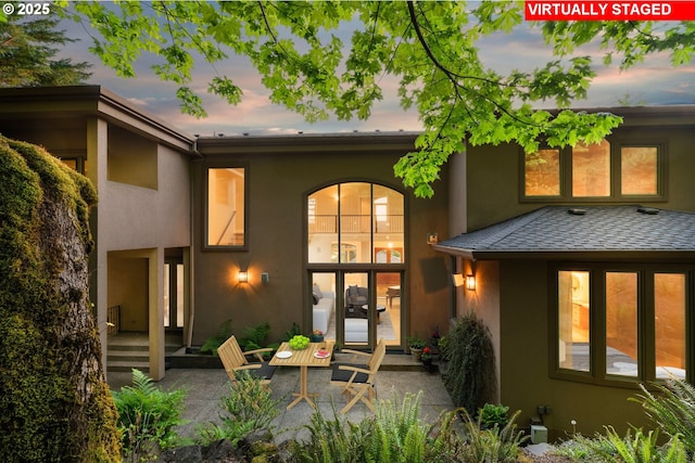 370 NW 81st Pl, Portland, OR 97229 - back of house at dusk featuring stucco siding