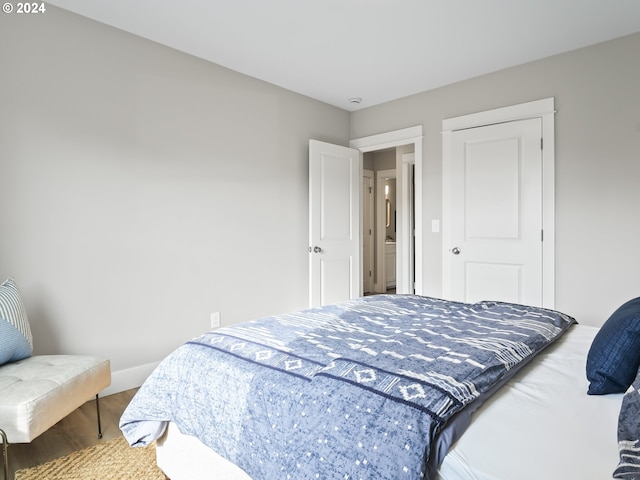 5325 NE Flanders St, Portland, OR 97213 - bedroom featuring wood finished floors and baseboards