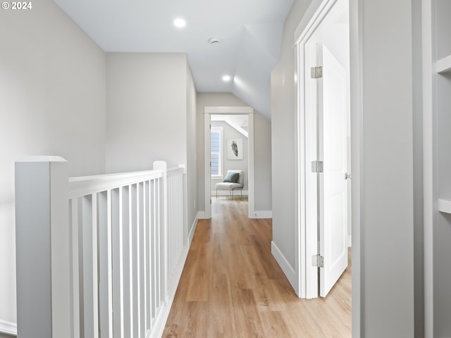 5325 NE Flanders St, Portland, OR 97213 - hall with light wood-style flooring, lofted ceiling, recessed lighting, an upstairs landing, and baseboards