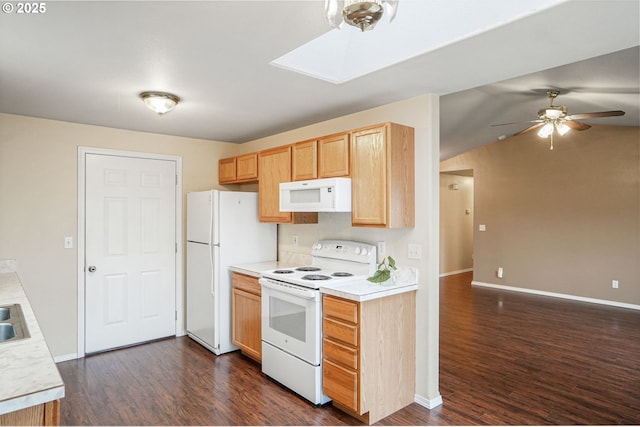 kitchen with white appliances, light countertops, ceiling fan, and dark wood-style flooring