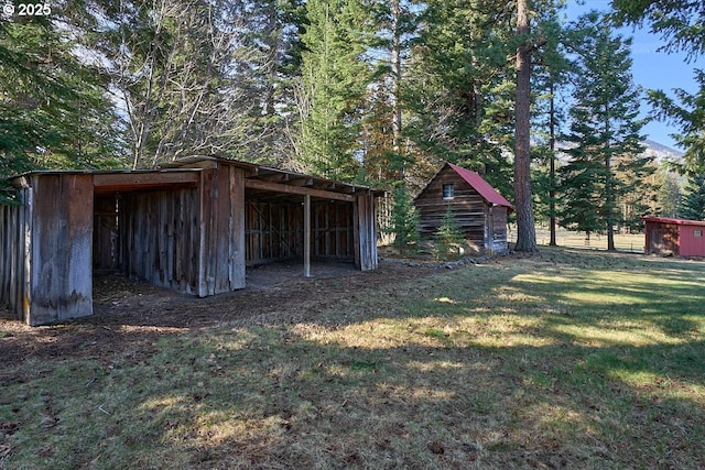 view of pole building with a lawn