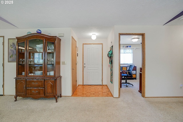 5219 Lacey Ct N, Keizer, OR 97303 - entryway featuring light carpet and a textured ceiling
