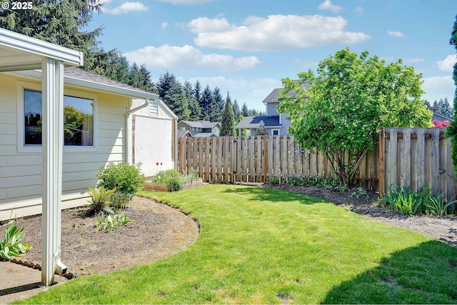 5219 Lacey Ct N, Keizer, OR 97303 - view of yard with a vegetable garden and a fenced backyard