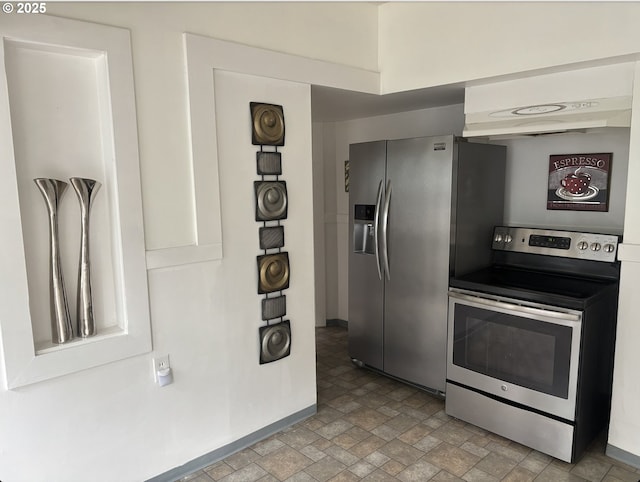 1824 NE 52nd Ave, Portland, OR 97213 - kitchen featuring appliances with stainless steel finishes and stone finish floors