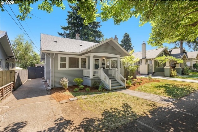 1824 NE 52nd Ave, Portland, OR 97213 - view of front of home with driveway, roof with shingles, and a porch