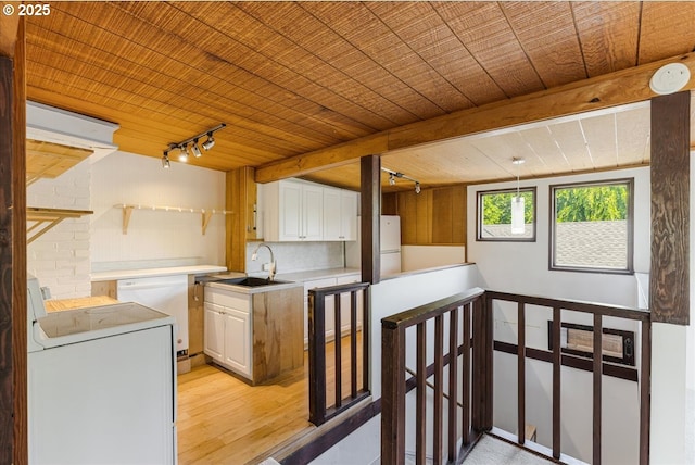 1824 NE 52nd Ave, Portland, OR 97213 - kitchen featuring a wood ceiling with exposed beams, open shelves, track lighting, light countertops, and white cabinets