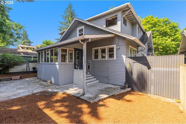 1824 NE 52nd Ave, Portland, OR 97213 - view of front of house with a patio area and a sunroom