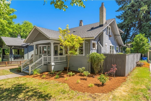 1824 NE 52nd Ave, Portland, OR 97213 - view of front of house with a chimney and a shingled roof