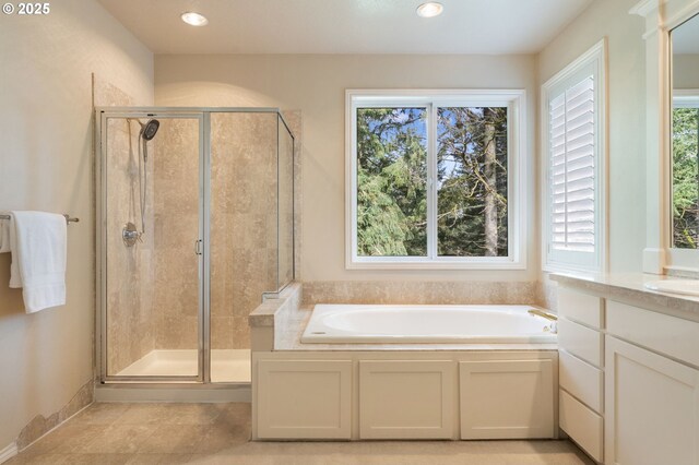 13581 SW Essex Dr, Portland, OR 97223 - bathroom with a shower stall, a garden tub, vanity, and recessed lighting