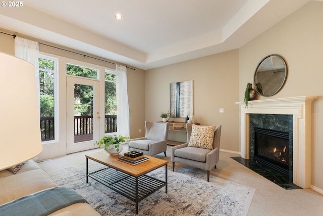13581 SW Essex Dr, Portland, OR 97223 - carpeted living room with a fireplace, recessed lighting, and baseboards