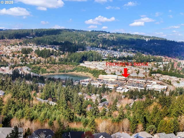 13581 SW Essex Dr, Portland, OR 97223 - aerial view of property's location featuring a forest and a large body of water