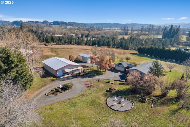 aerial view featuring a mountain view and a rural view