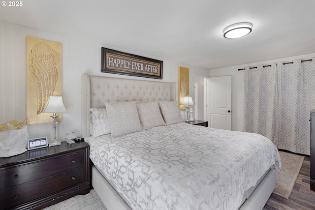 bedroom featuring wood finished floors