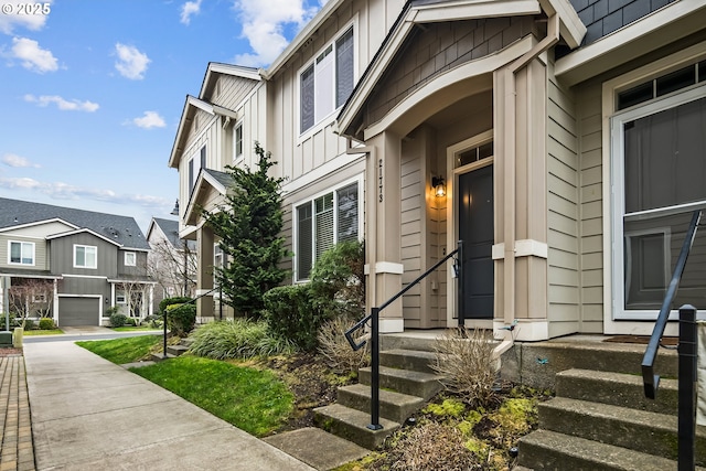 view of exterior entry featuring a garage