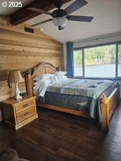 70202 Potato Bottom Rd, Lakeside, OR 97449 - bedroom featuring dark wood-type flooring, wood walls, access to exterior, and a ceiling fan