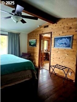 70202 Potato Bottom Rd, Lakeside, OR 97449 - bedroom with multiple windows, wooden walls, and dark wood-type flooring