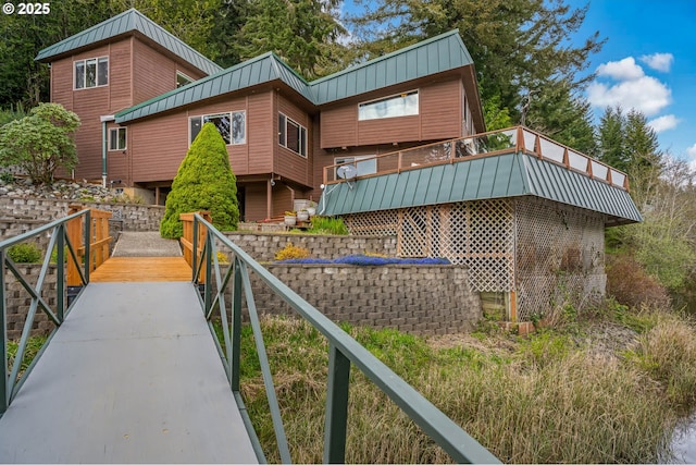 70202 Potato Bottom Rd, Lakeside, OR 97449 - back of house featuring metal roof and a standing seam roof