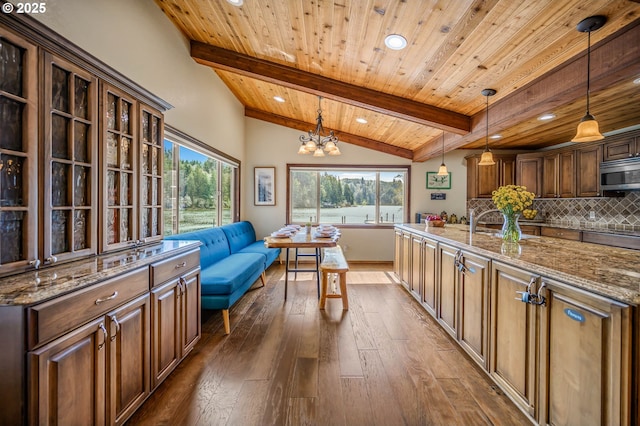 70202 Potato Bottom Rd, Lakeside, OR 97449 - kitchen featuring stainless steel microwave, wood ceiling, dark wood-type flooring, recessed lighting, and stone counters
