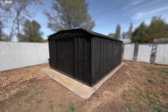 755 NE Ochoco Ave, Prineville, OR 97754 - view of shed with a fenced backyard