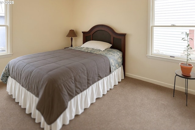 755 NE Ochoco Ave, Prineville, OR 97754 - bedroom featuring carpet floors, baseboards, and multiple windows