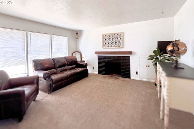 755 NE Ochoco Ave, Prineville, OR 97754 - living room with baseboards, a fireplace with flush hearth, and carpet