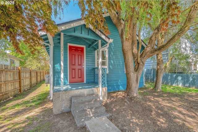 property entrance featuring fence