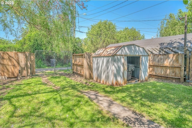 view of shed featuring a fenced backyard