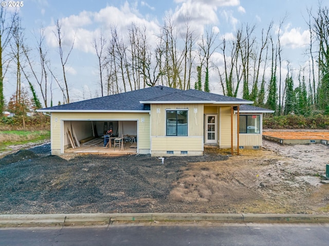 view of front of home with a garage