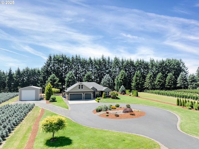 36280 SE Hauglum Rd, Boring, OR 97009 - view of front of property featuring a front lawn, curved driveway, and a detached garage