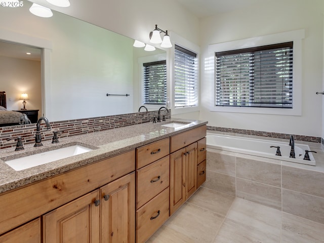 36280 SE Hauglum Rd, Boring, OR 97009 - full bath featuring double vanity, a garden tub, tasteful backsplash, and tile patterned flooring