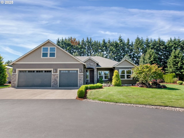 36280 SE Hauglum Rd, Boring, OR 97009 - craftsman inspired home featuring stone siding, a front yard, concrete driveway, and an attached garage