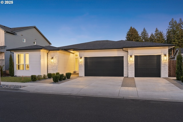 view of front of property with a garage