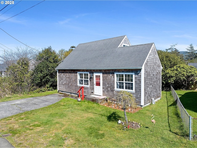 925 S Irvine Pl, Seaside, OR 97138 - new england style home with a shingled roof