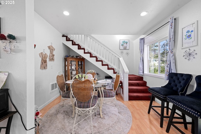 925 S Irvine Pl, Seaside, OR 97138 - dining area with stairs, wood finished floors, and recessed lighting