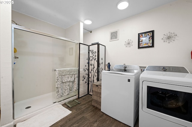 925 S Irvine Pl, Seaside, OR 97138 - washroom with washer and clothes dryer and dark wood-style floors