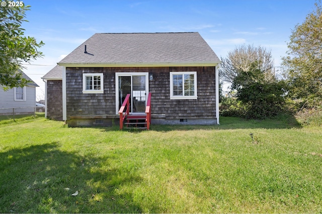 925 S Irvine Pl, Seaside, OR 97138 - back of house with entry steps, a lawn, and roof with shingles